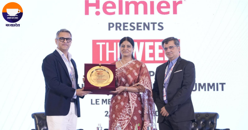 Representative receiving an award at The Week Healthcare and Innovation Conclave for contributions to medical device self-reliance in India.